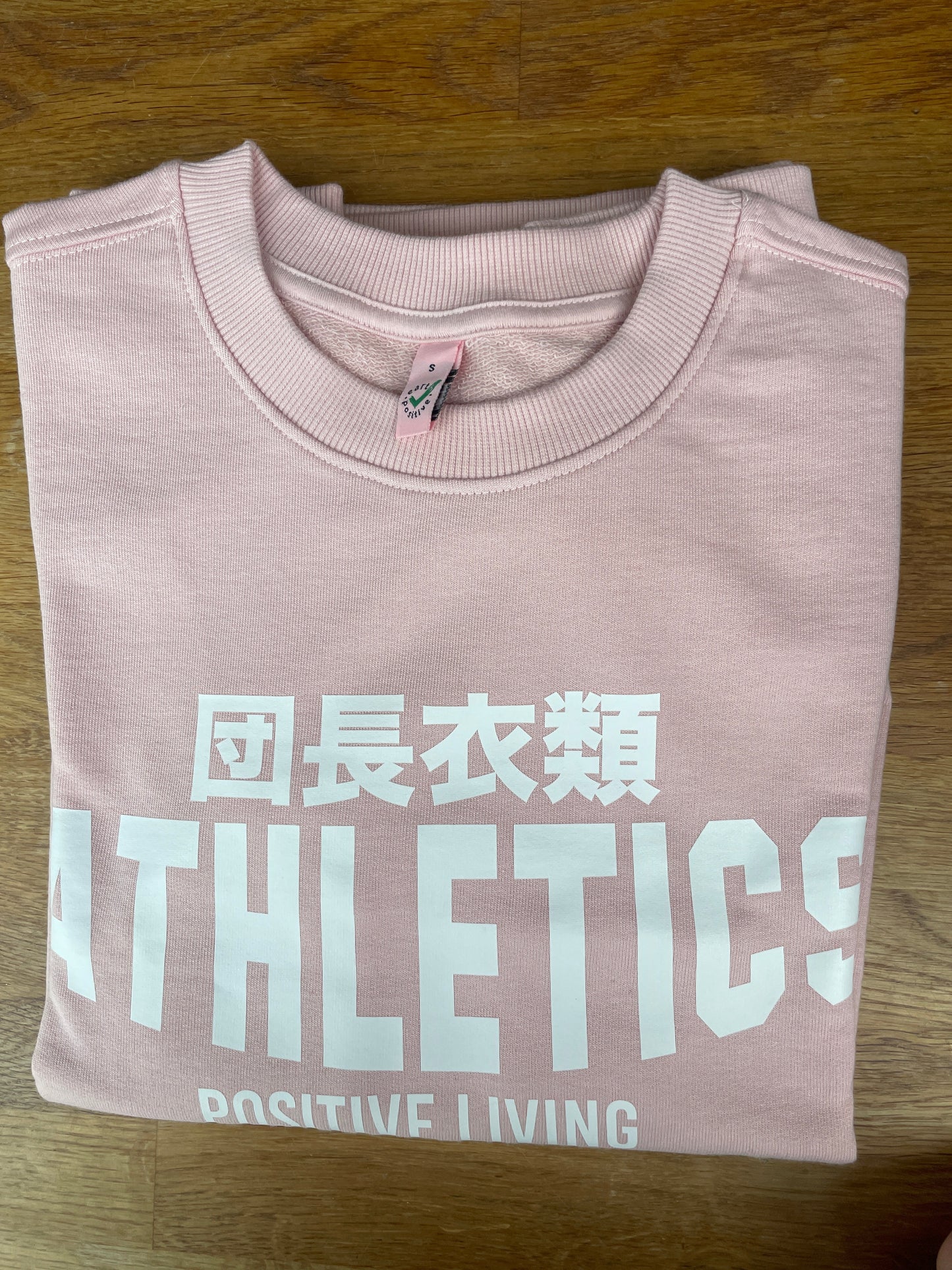 Ladies washed washed pink Athletics positive living Crew Sweat