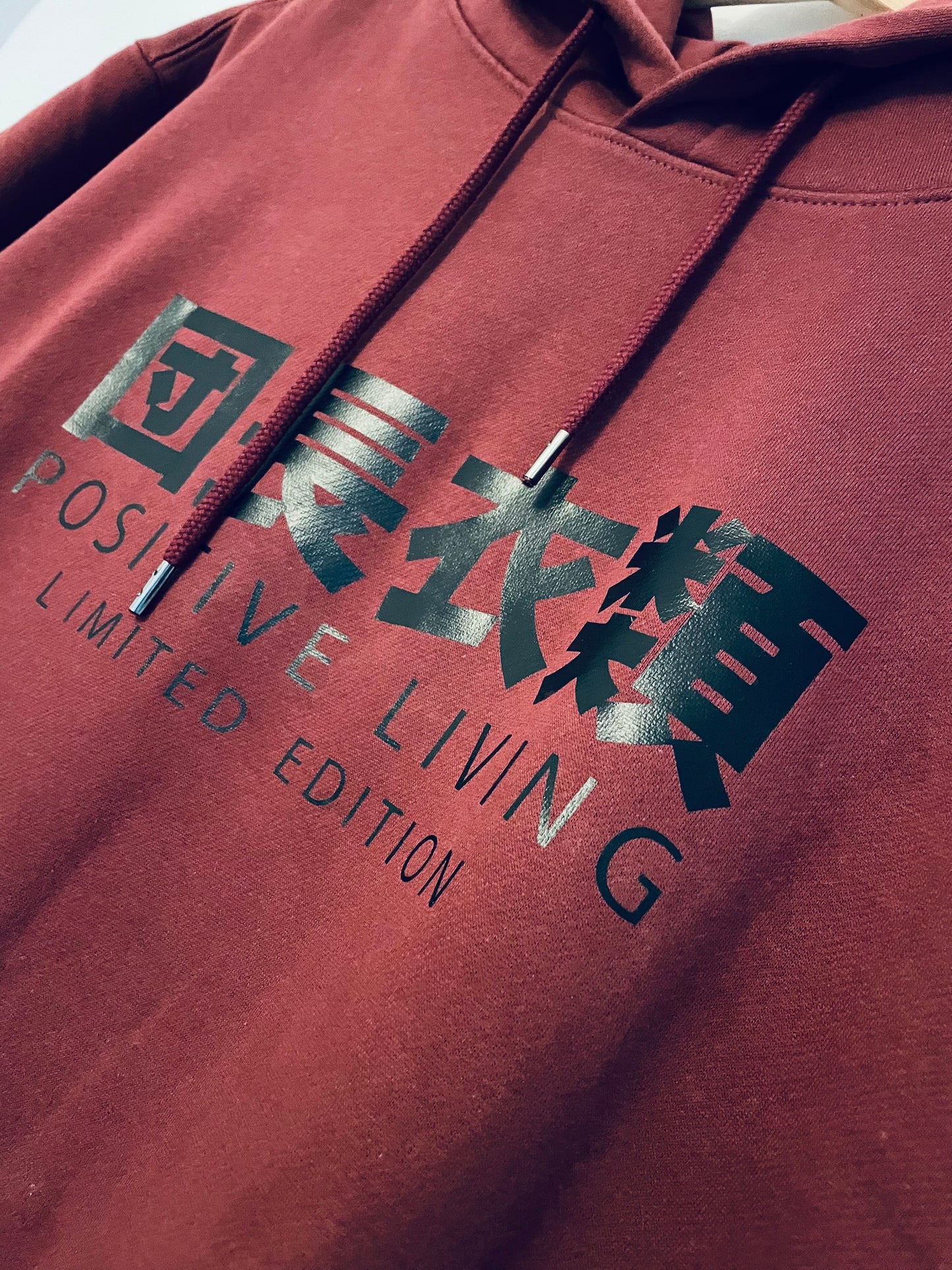 Positive Living logo Burgundy Unisex HOODY